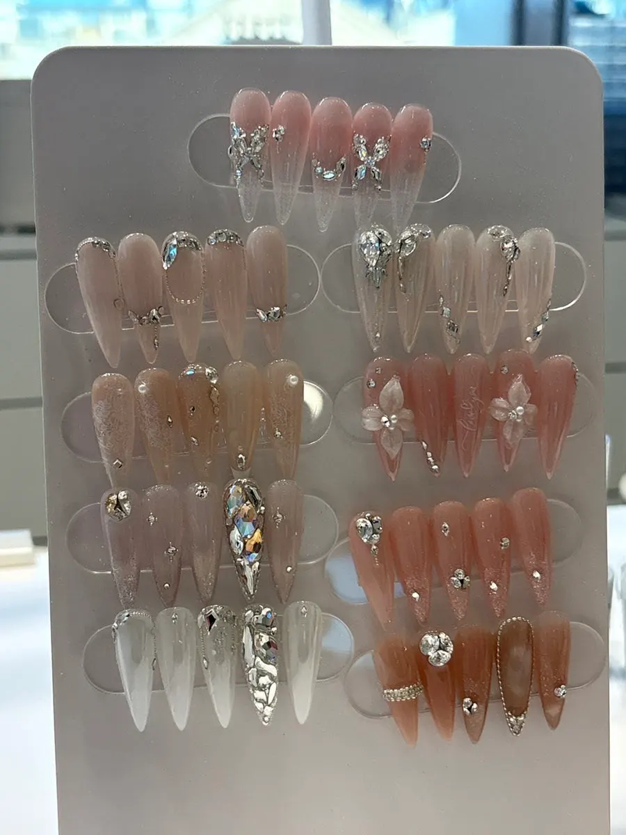 Wedding nail art with stone accents