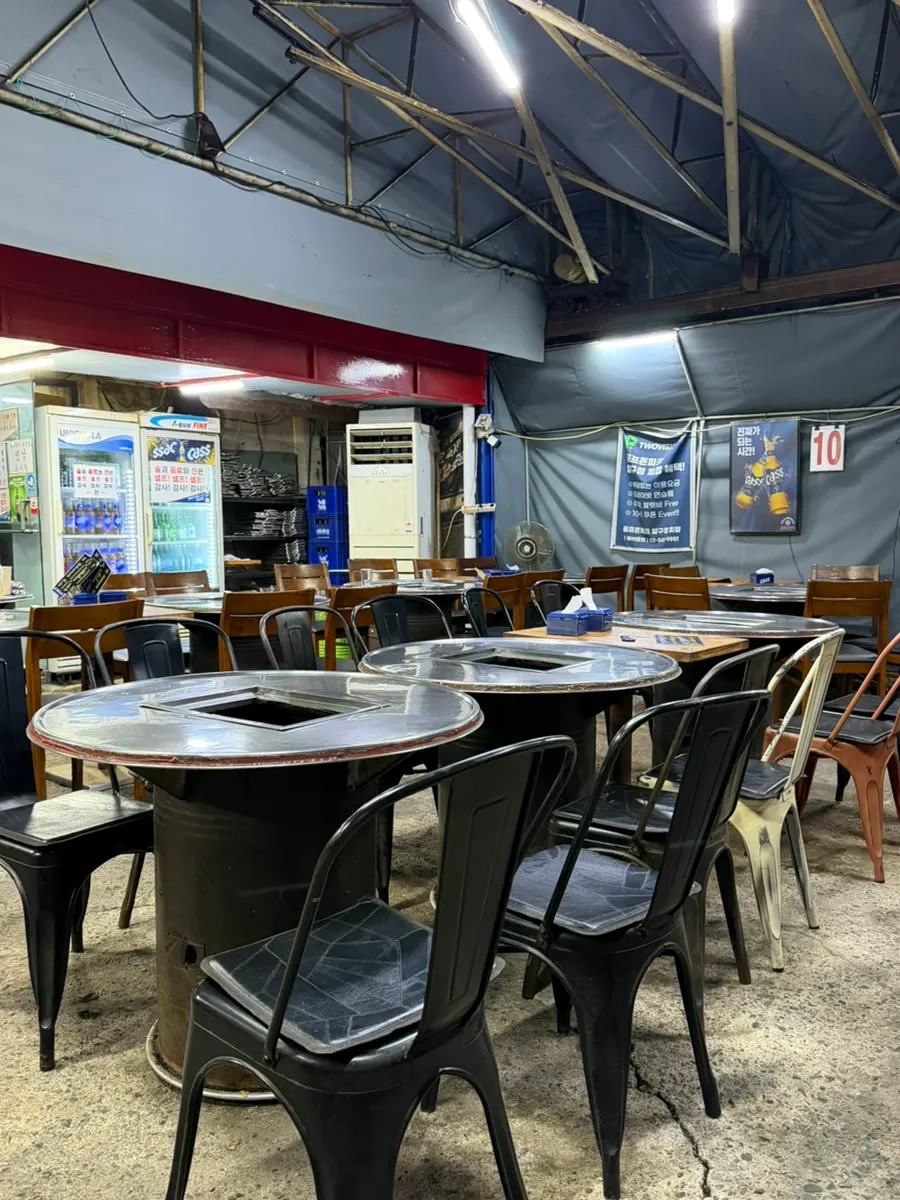 Charcoal tables set up in the open-air dining atmosphere