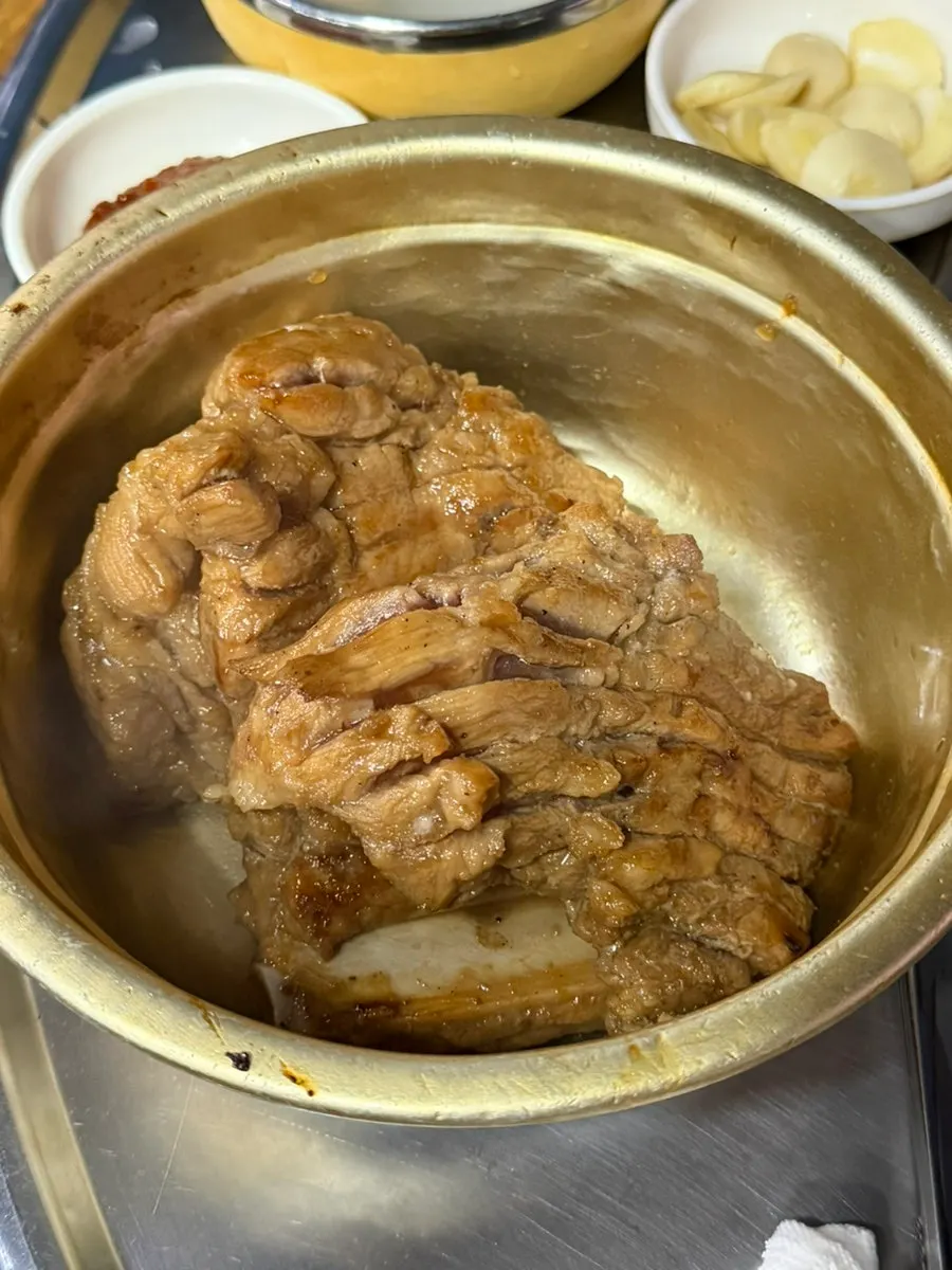 Plate of raw pork ribs ordered as four servings