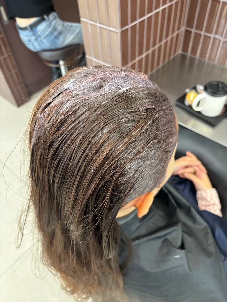 The existing orange-brown-toned dye color