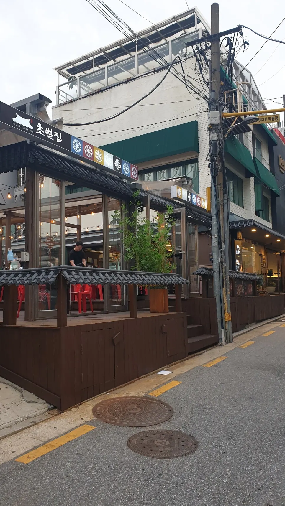 Exterior of Chobeoljip Apgujeong Rodeo Branch decorated in hanok tile-roof style