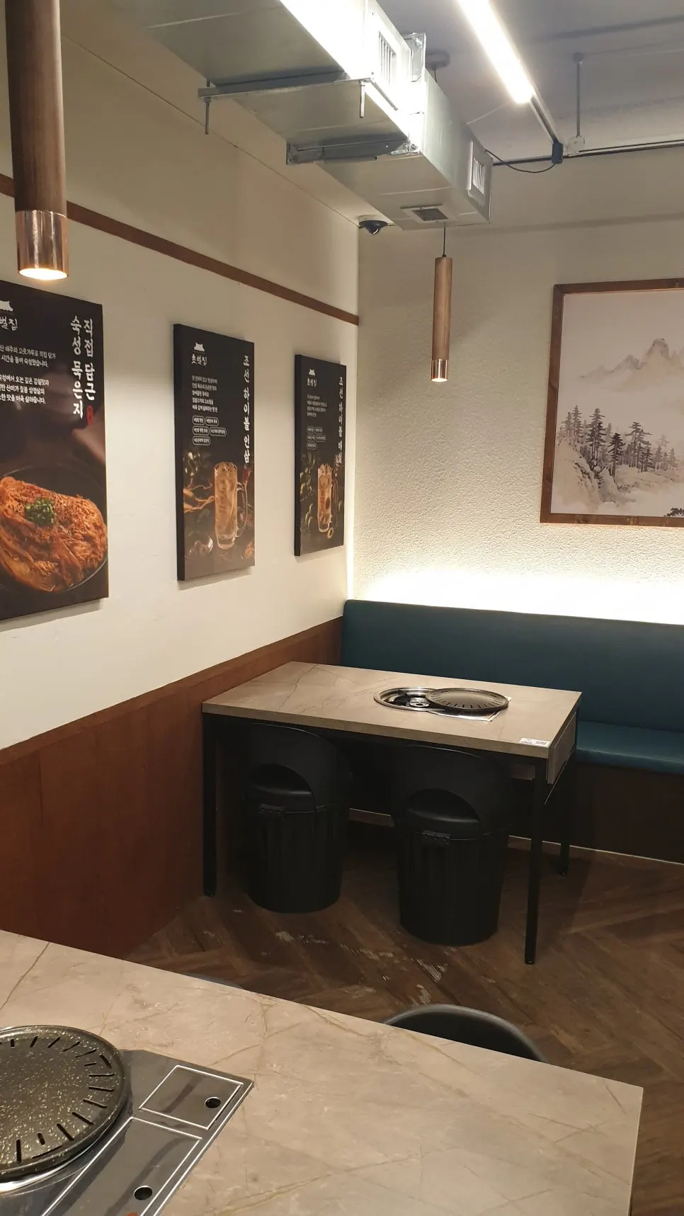 Indoor seating at Chobeoljip mostly arranged for 4 people