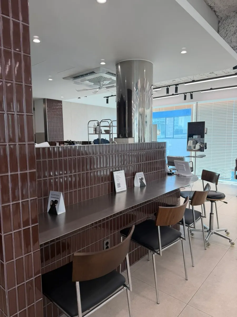 Bright, airy waiting area of the salon