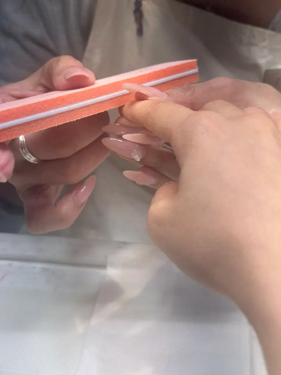Nail care treatment in progress