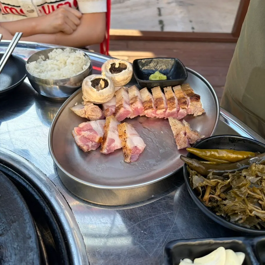 Thick, meaty two portions of par-grilled bone-in pork belly