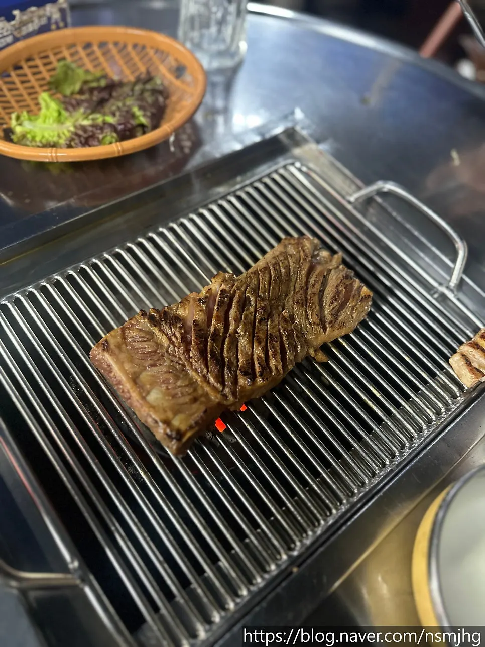 Two servings of seasoned pork rib served at Yeontan Gongjang