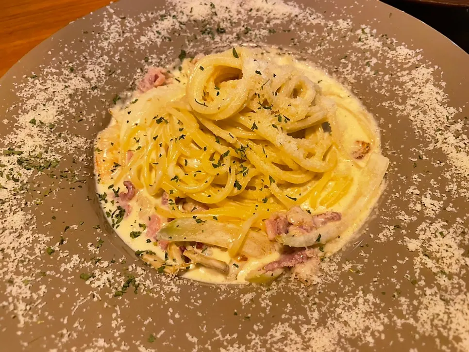 Full spread of pasta and steak rice dishes