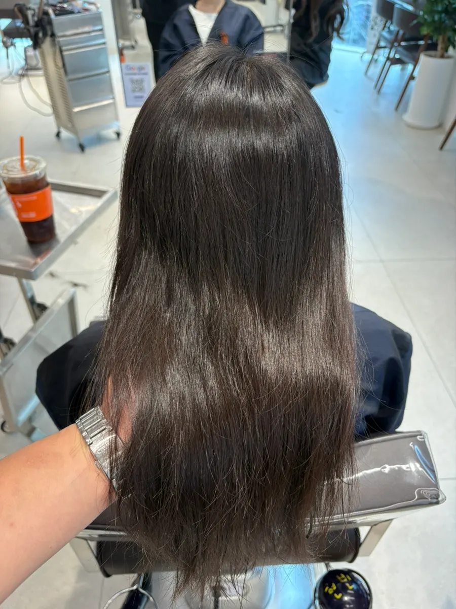 Receiving the volume magic straightening treatment