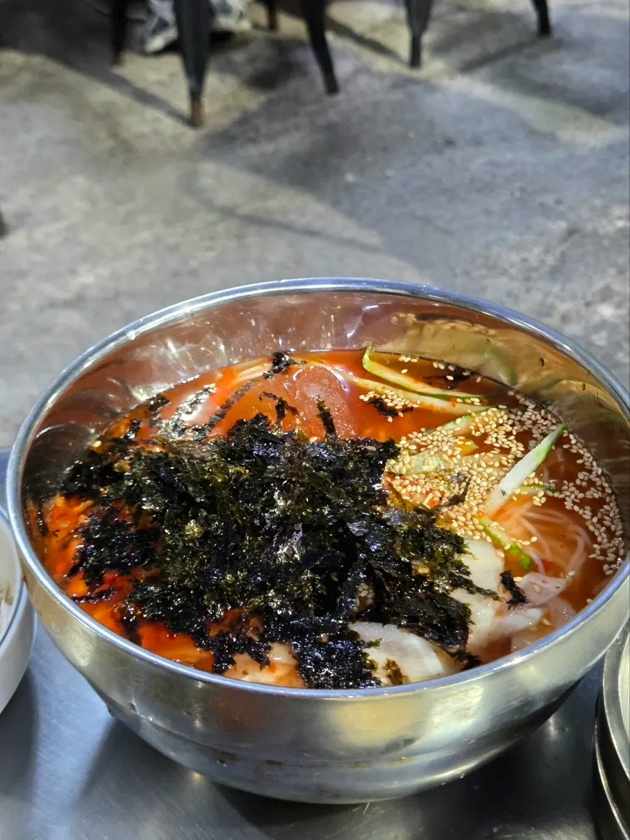 A bowl of cool kimchi mari guksu