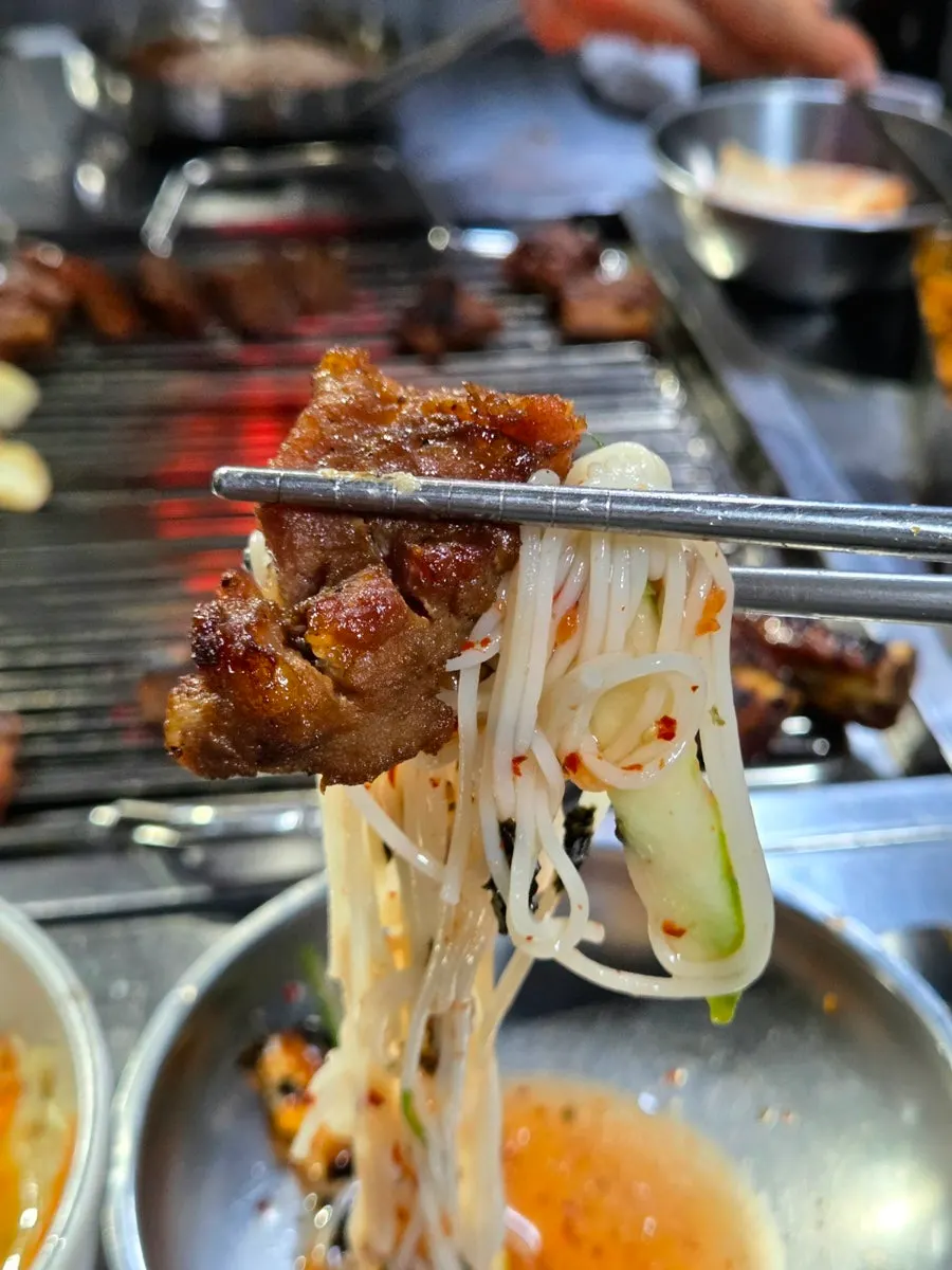 Close-up of a bowl of kimchi mari guksu