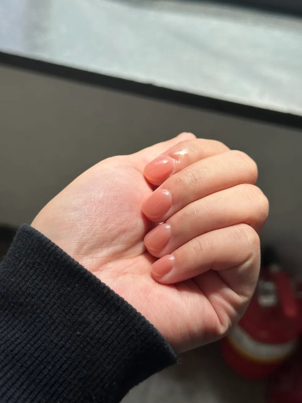 Syrup-color nails seen up close
