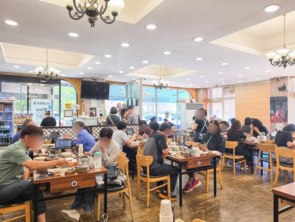 Interior of Appa Jjim filled with weekday lunch guests