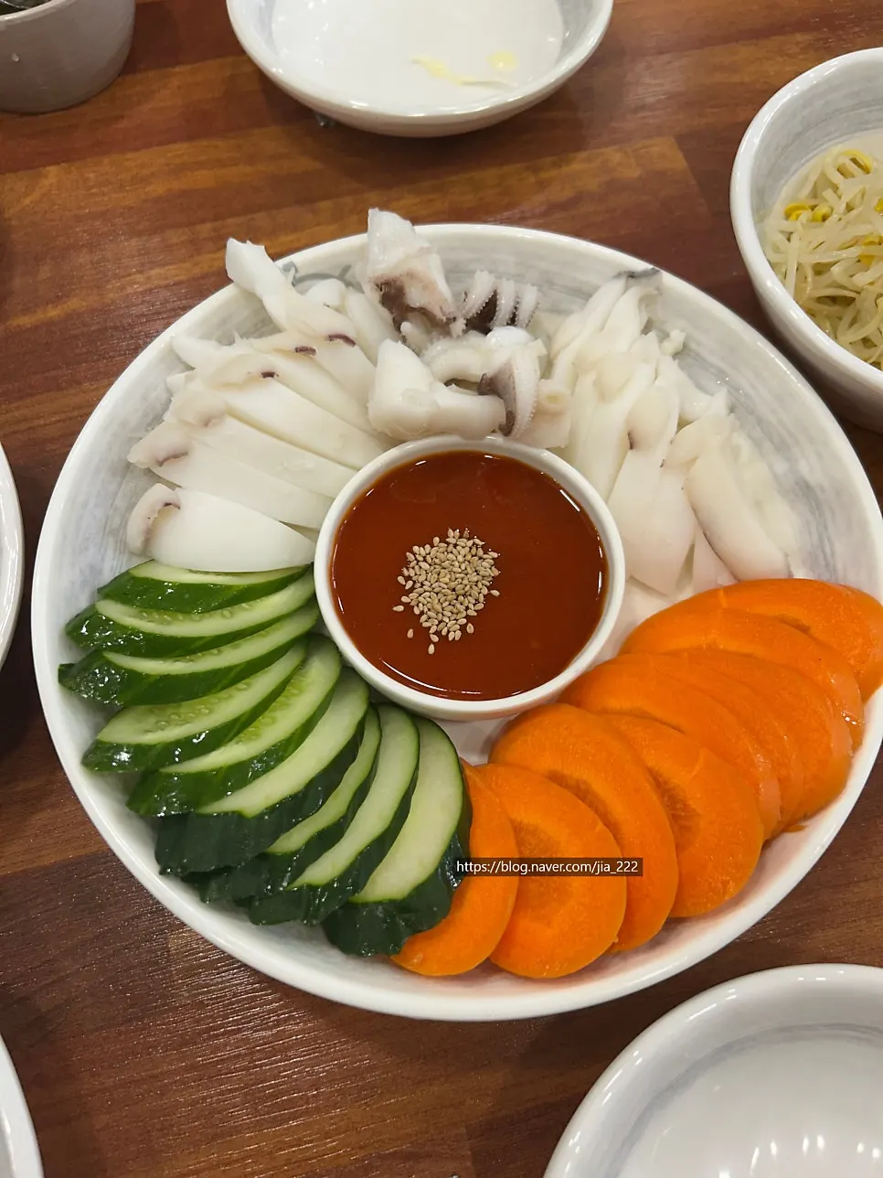 Plate of thickly sliced cuttlefish sashimi