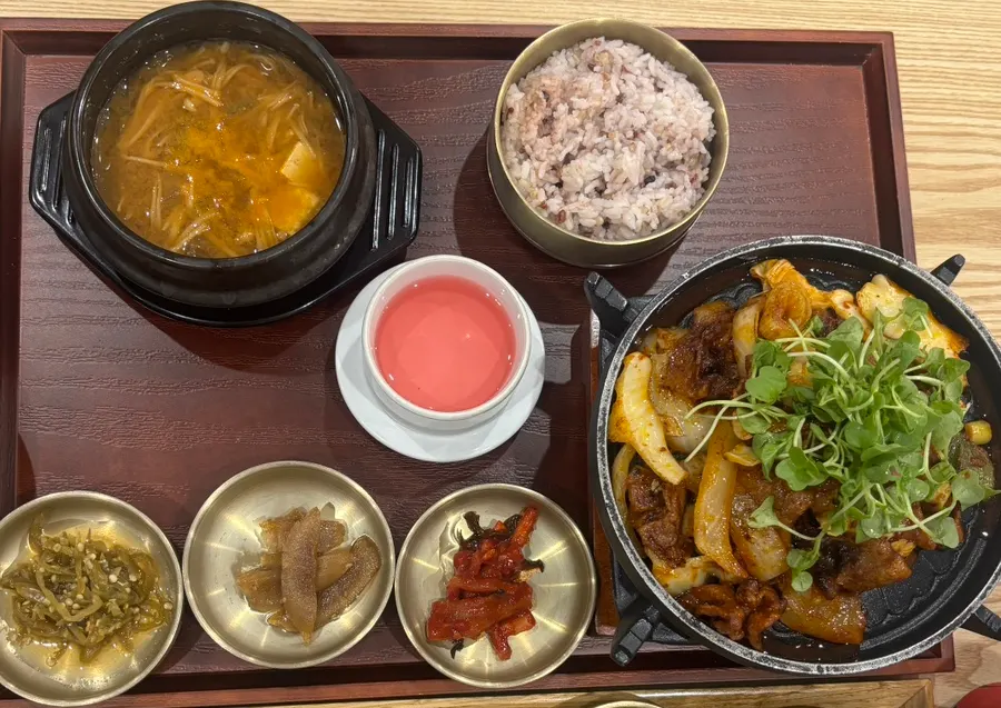 Korean table setting with all ordered dishes served