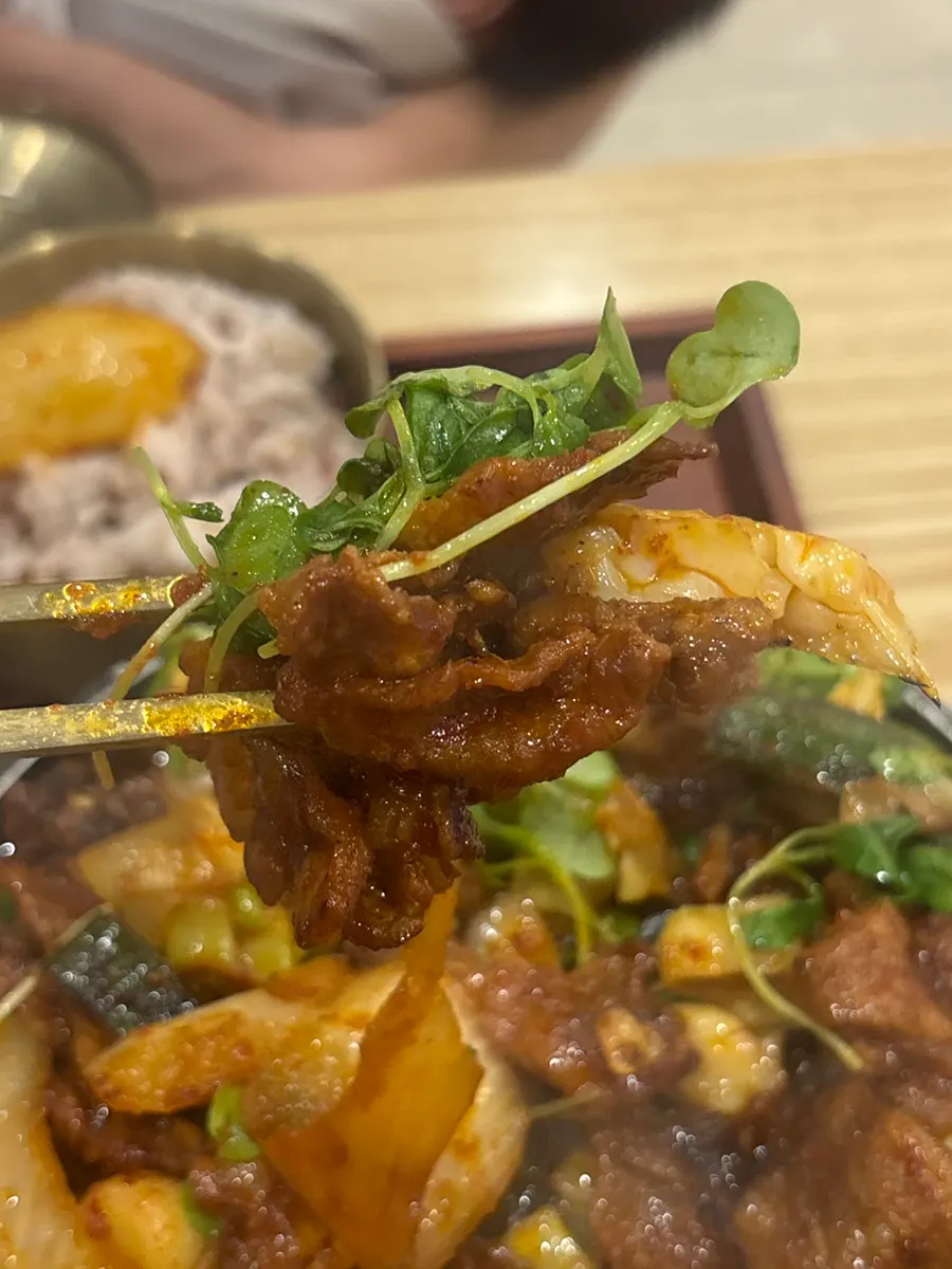 Charcoal-grilled spicy pork infused with seasoning