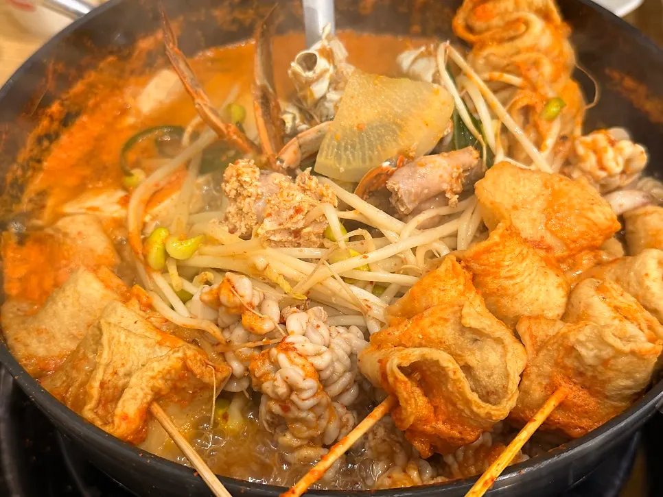 Spicy seafood stew broth simmering