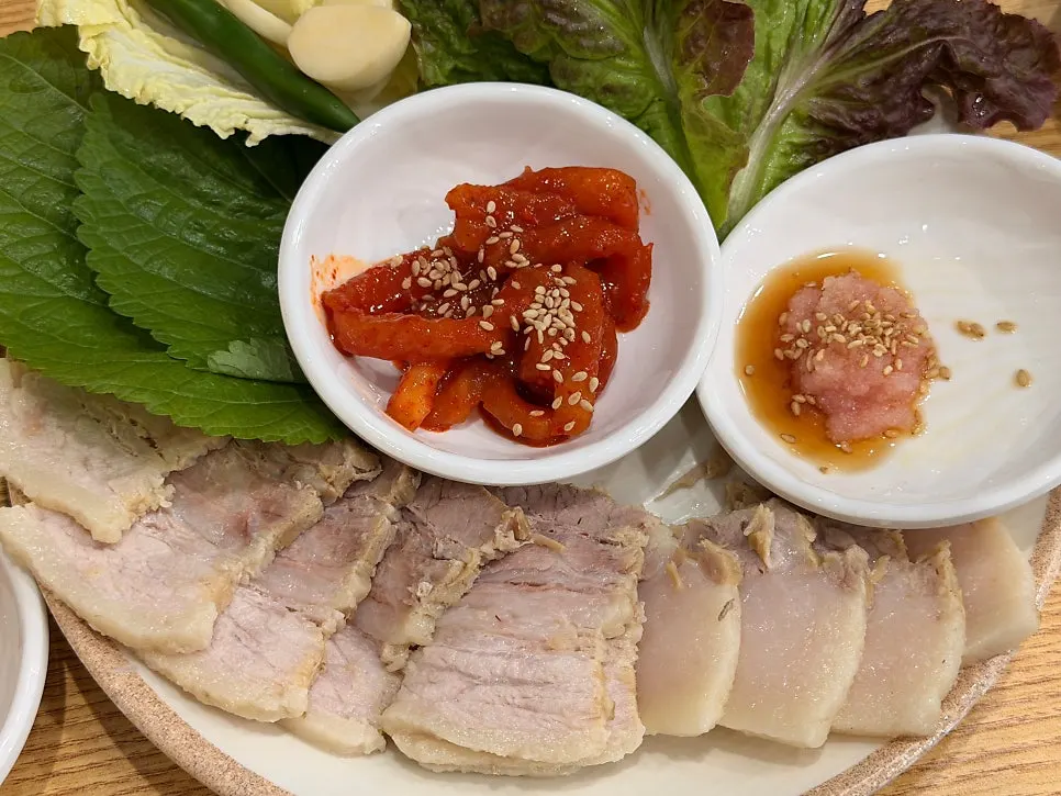 Radish kimchi and salted pollock roe served with the bossam