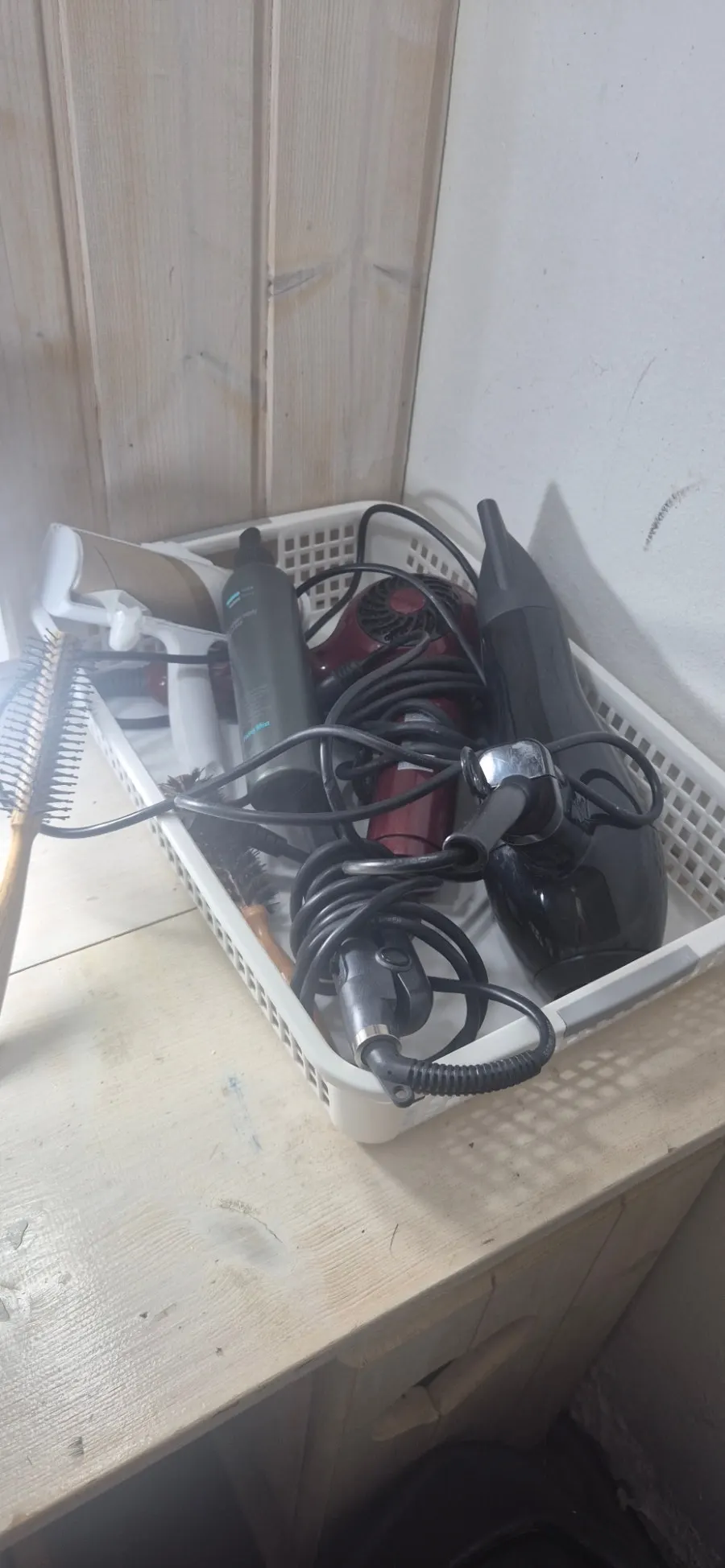 Powder room with a hairdryer and combs