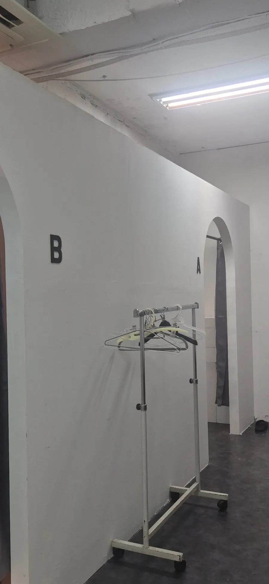 Coat hangers at the entrance to the shooting space