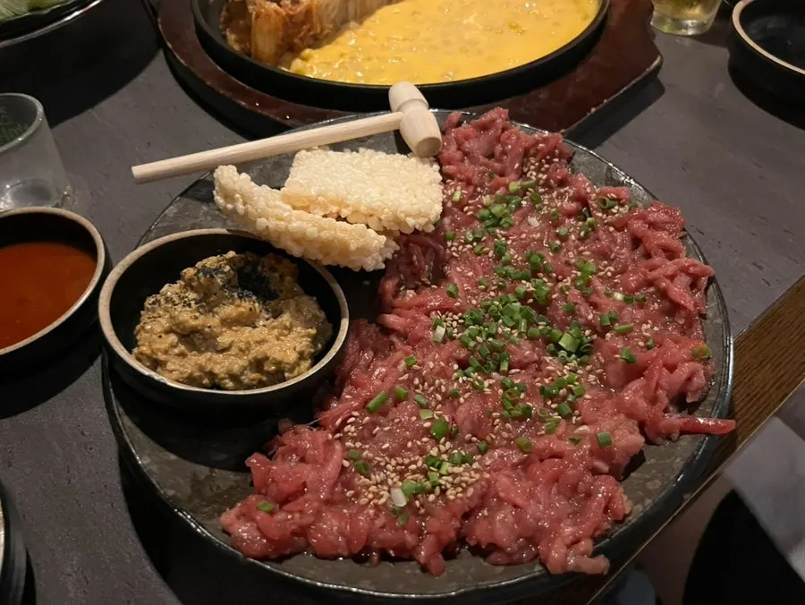 Plate of Arigyegok's monkfish liver yukhoe with crispy rice