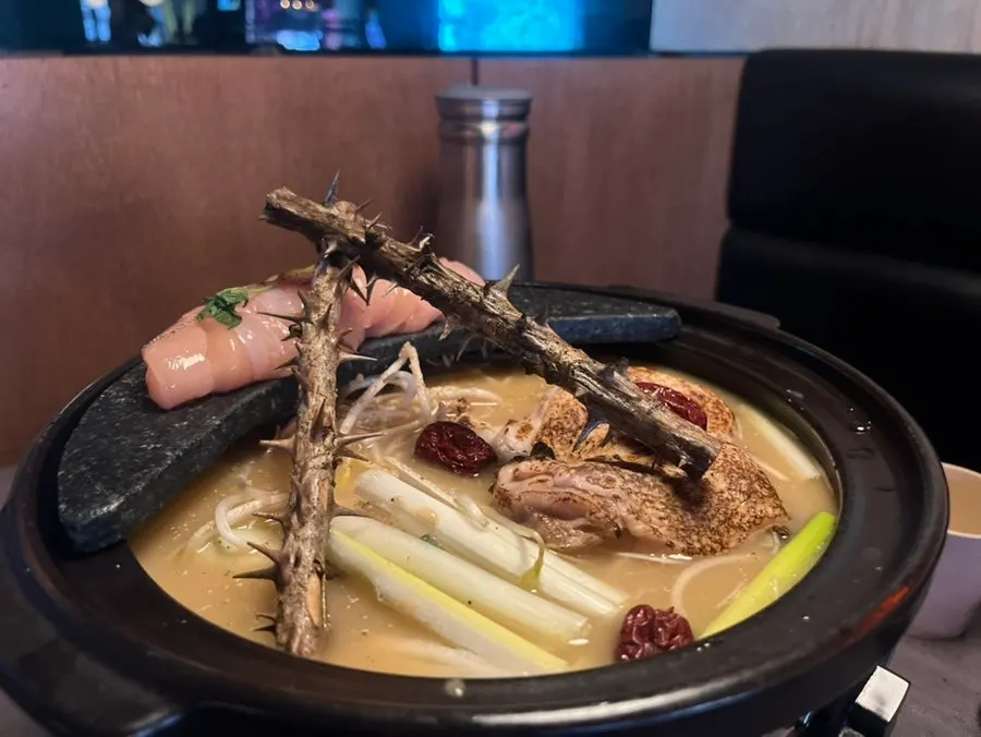 Perilla chicken hotpot set on the table before boiling