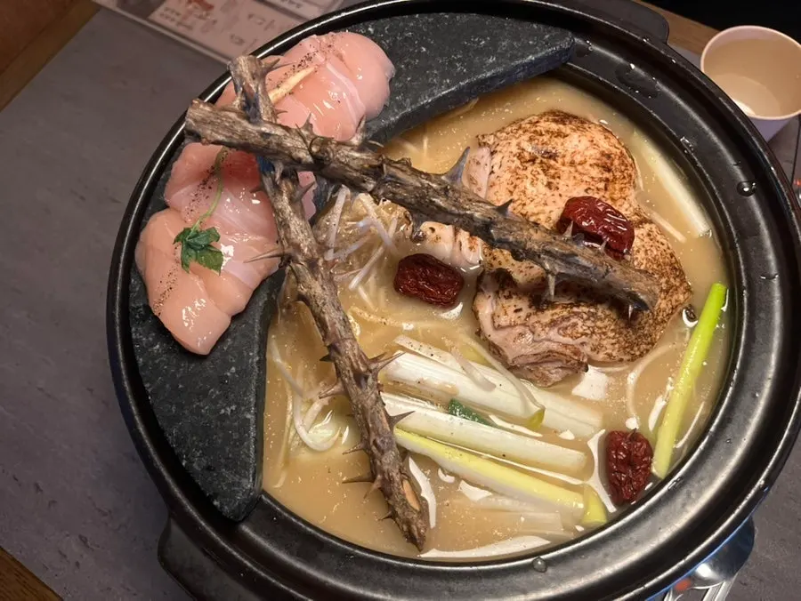 Pot of chicken hotpot with thick perilla broth