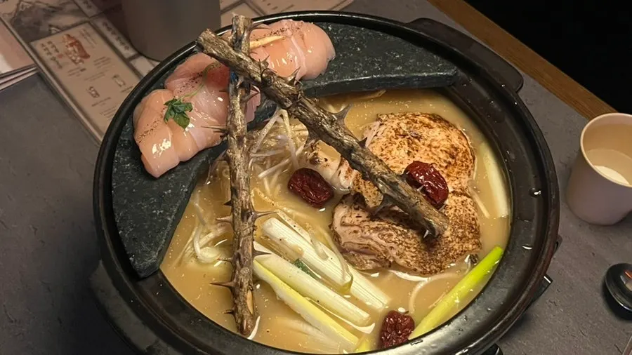 Close-up of the perilla chicken hotpot while waiting for it to cook