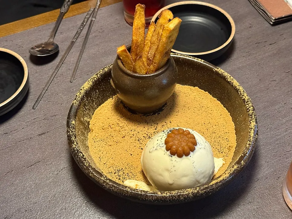 Plate with ice cream and mini yakgwa on top