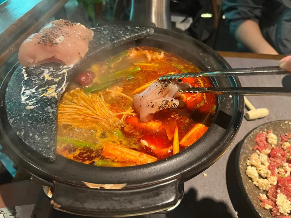 A piece of chicken tenderloin cooked shabu-shabu style