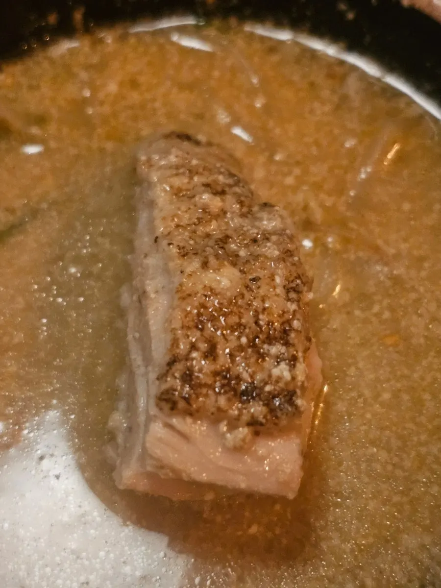 Pot of hot pot with pre-seared chicken added
