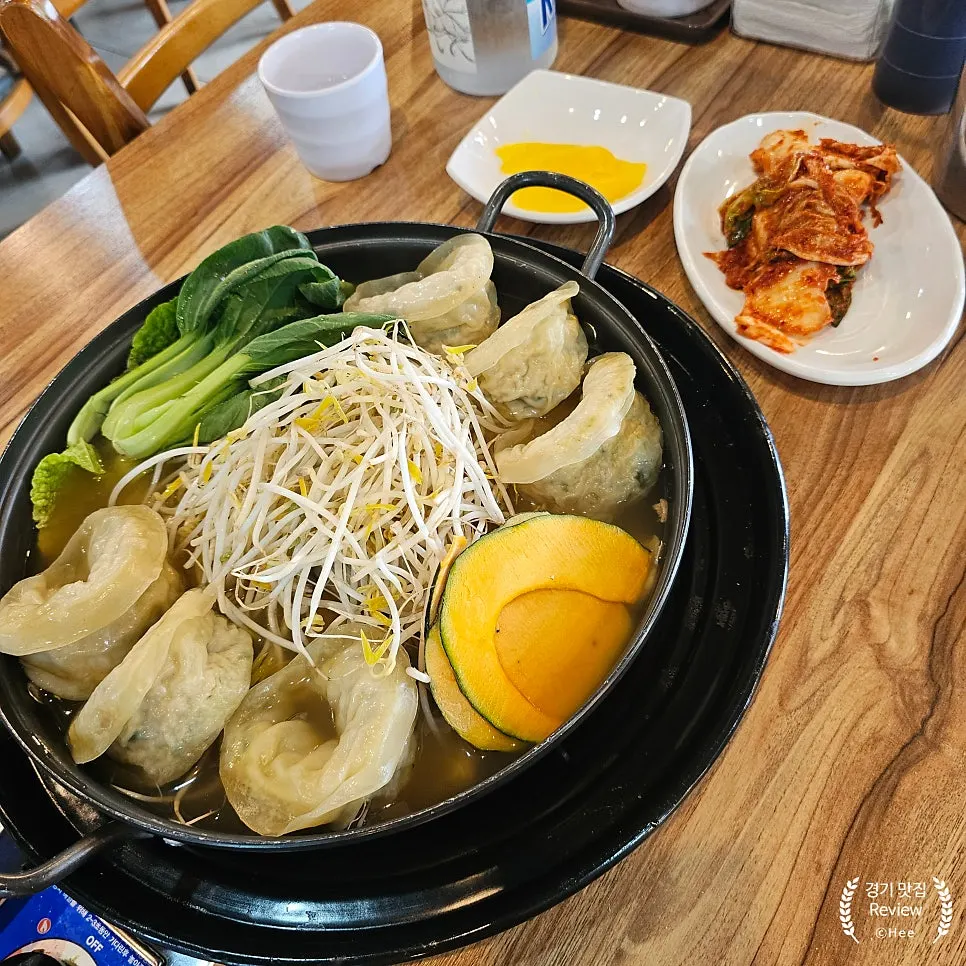 Hot pot filled with mushrooms and bean sprouts