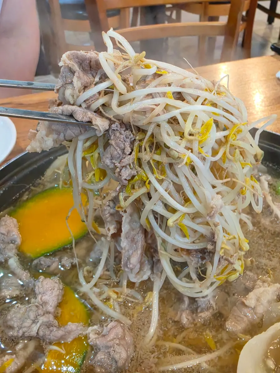 Beef shabu mandu hot pot at a boil