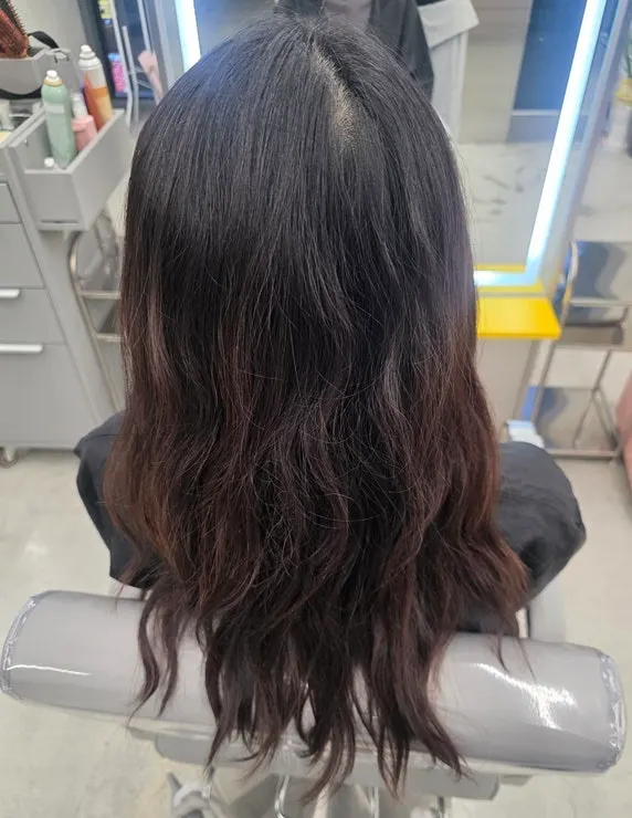 Long hair with reddish tones before dyeing