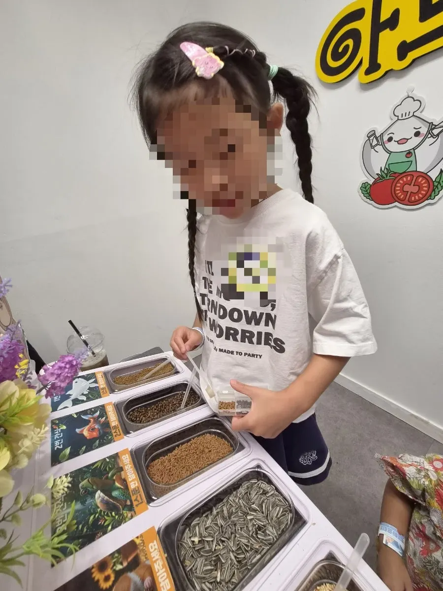 Filling food at the feeding prep corner