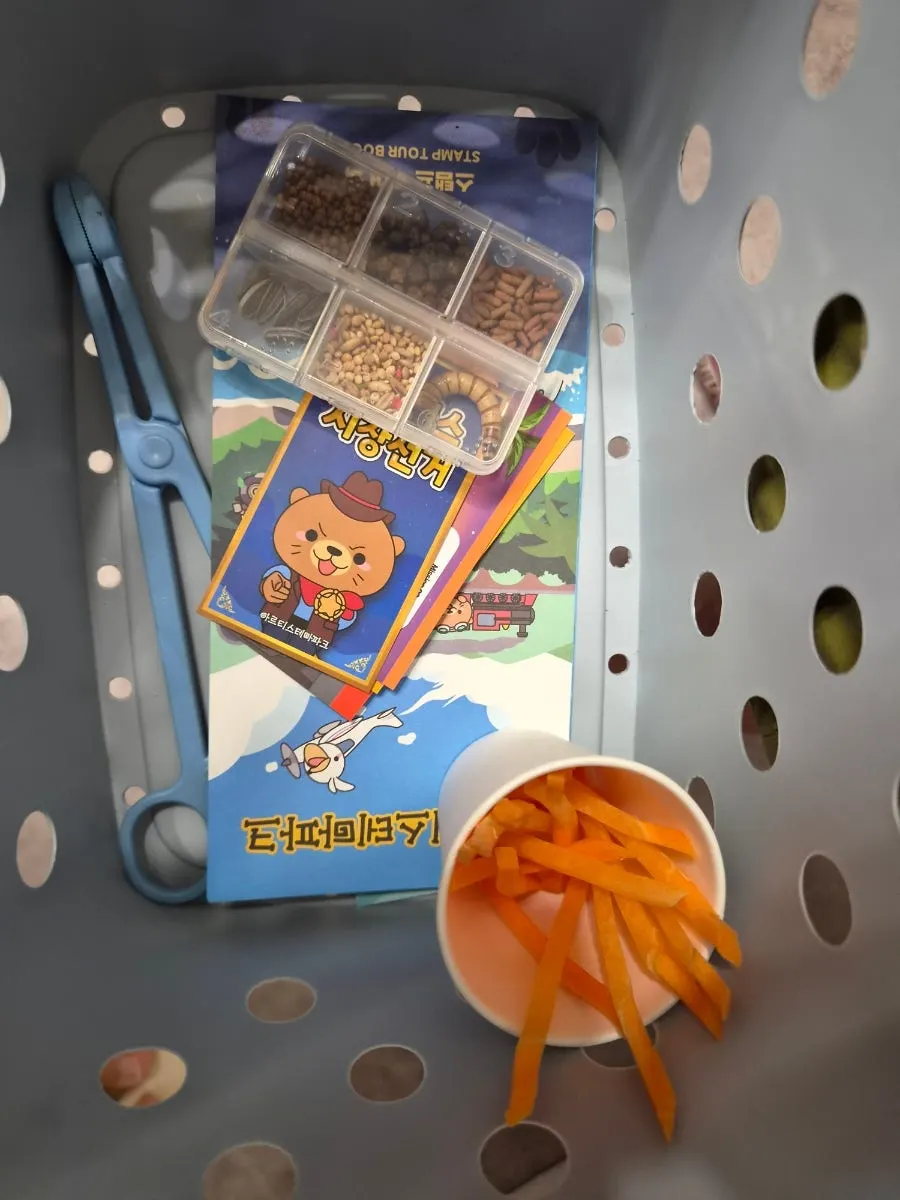A feeding cup filled with animal food