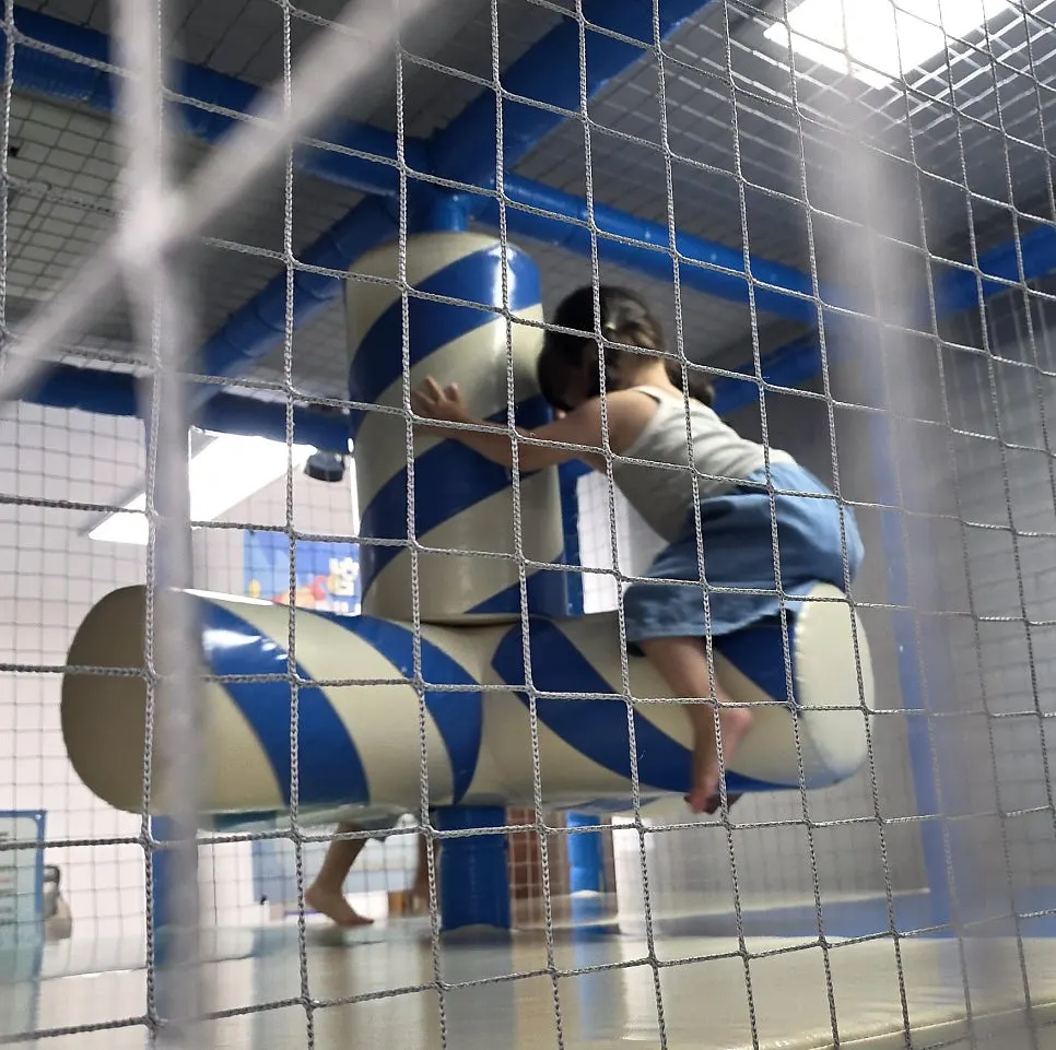 Indoor jungle gym and table seats for kids and parents