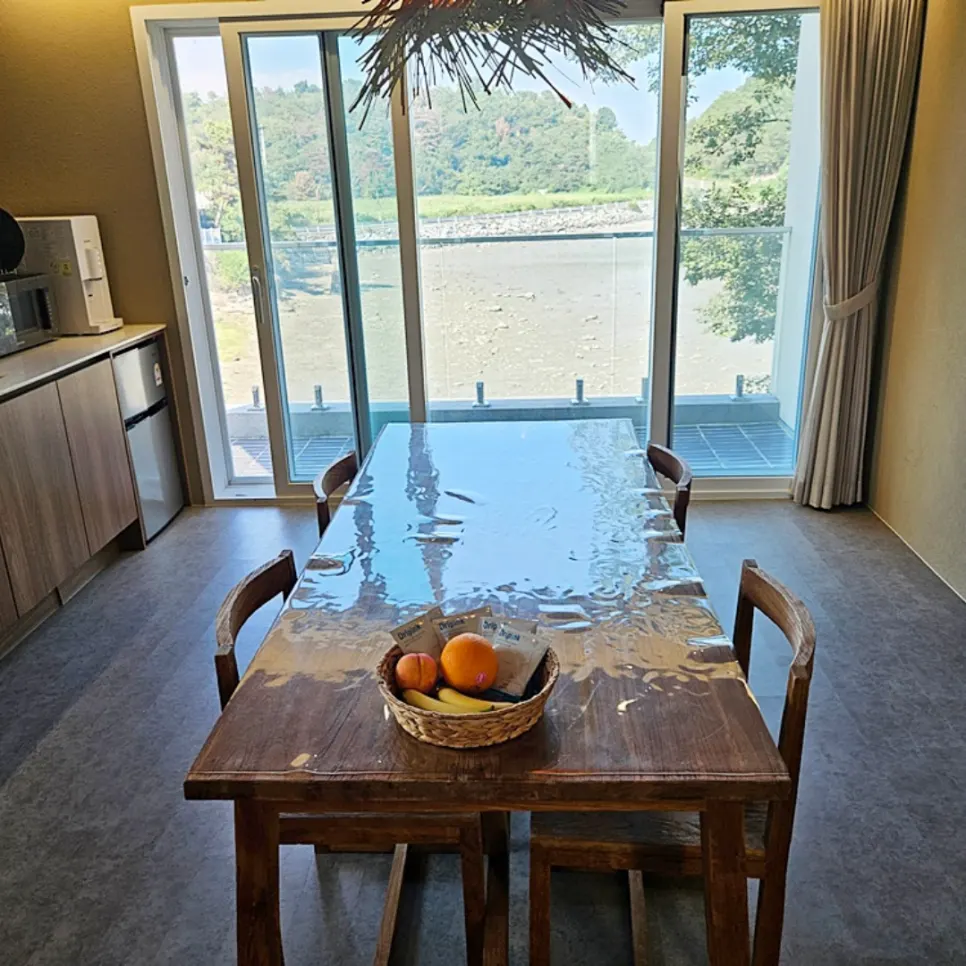 Interior of the 3-story standalone unit centered on the 1st-floor kitchen
