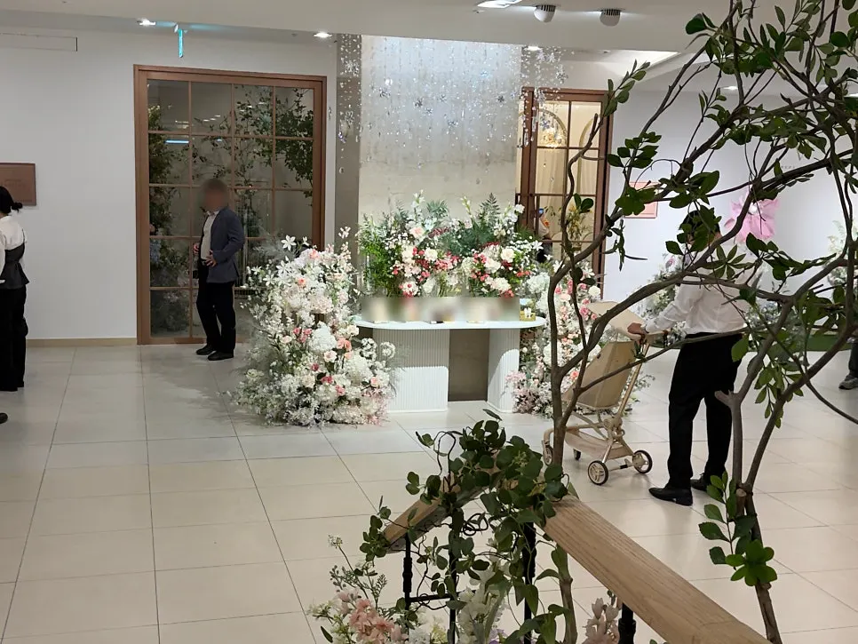 A couple looking around inside Arbe Wedding Hall