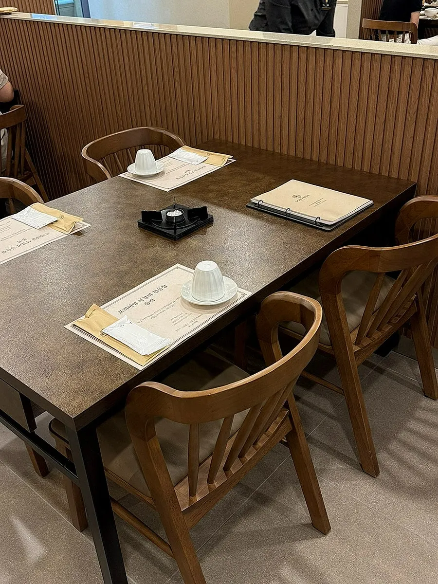 Interior of Dongbaek Seokgalbi with the open kitchen visible