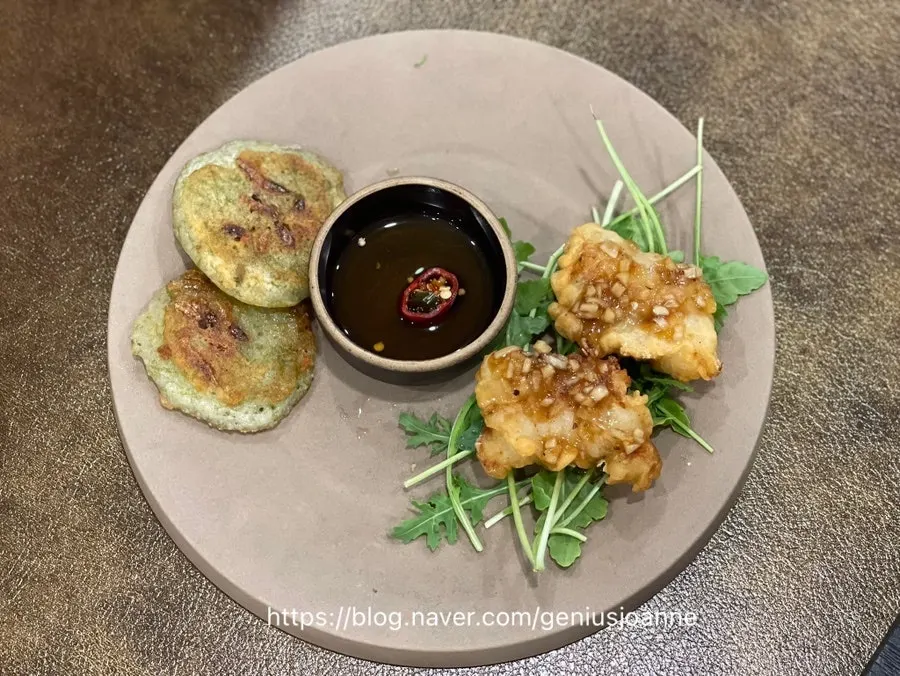 Fried monkfish and seasonal pancake in the table spread