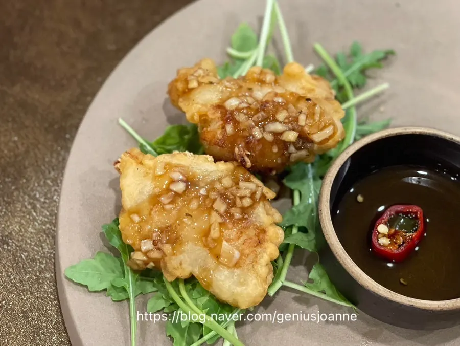 Fried monkfish served as part of the table spread
