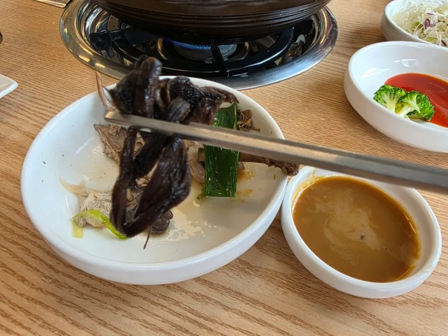 Varied mushrooms cooked in the broth