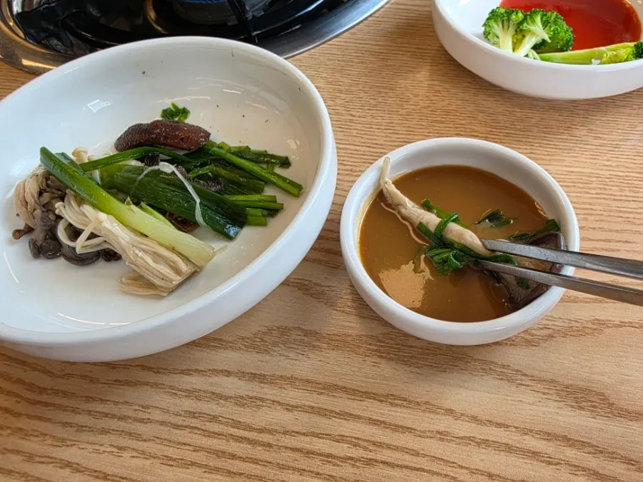 Mushrooms served alongside shabu baeksuk
