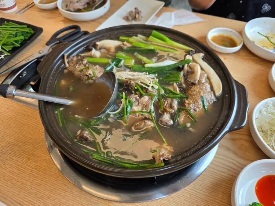 Cooked mushrooms dipped in mustard sauce
