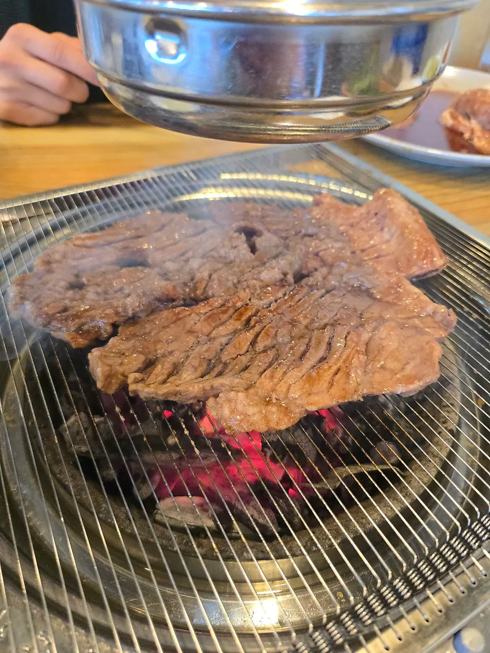 Pork galbi grilling on the wire rack