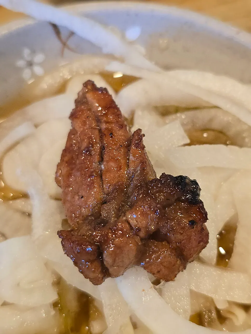 A cut piece of pork galbi