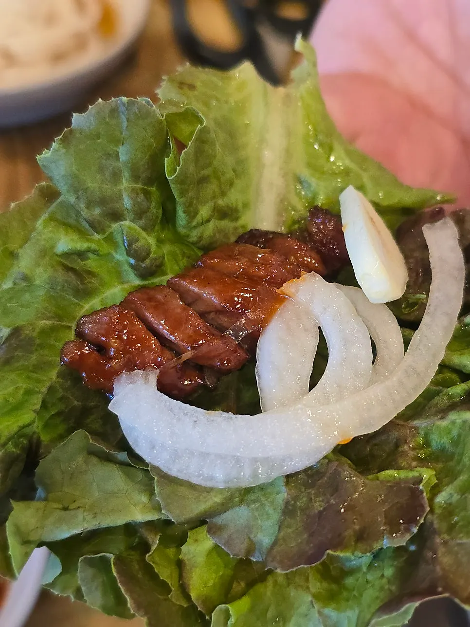 Pork galbi enjoyed wrapped in lettuce