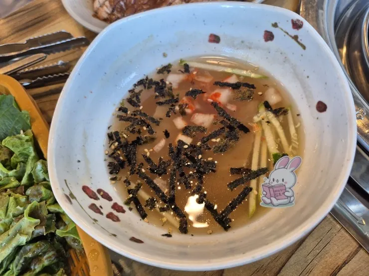 Close-up of a charcoal galbi restaurant's basic side dishes