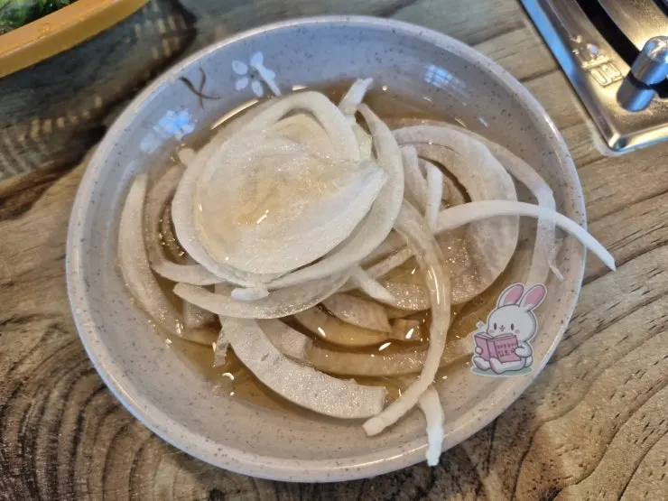 Side dishes and wrap vegetables at Ilpum Chamsut Galbi