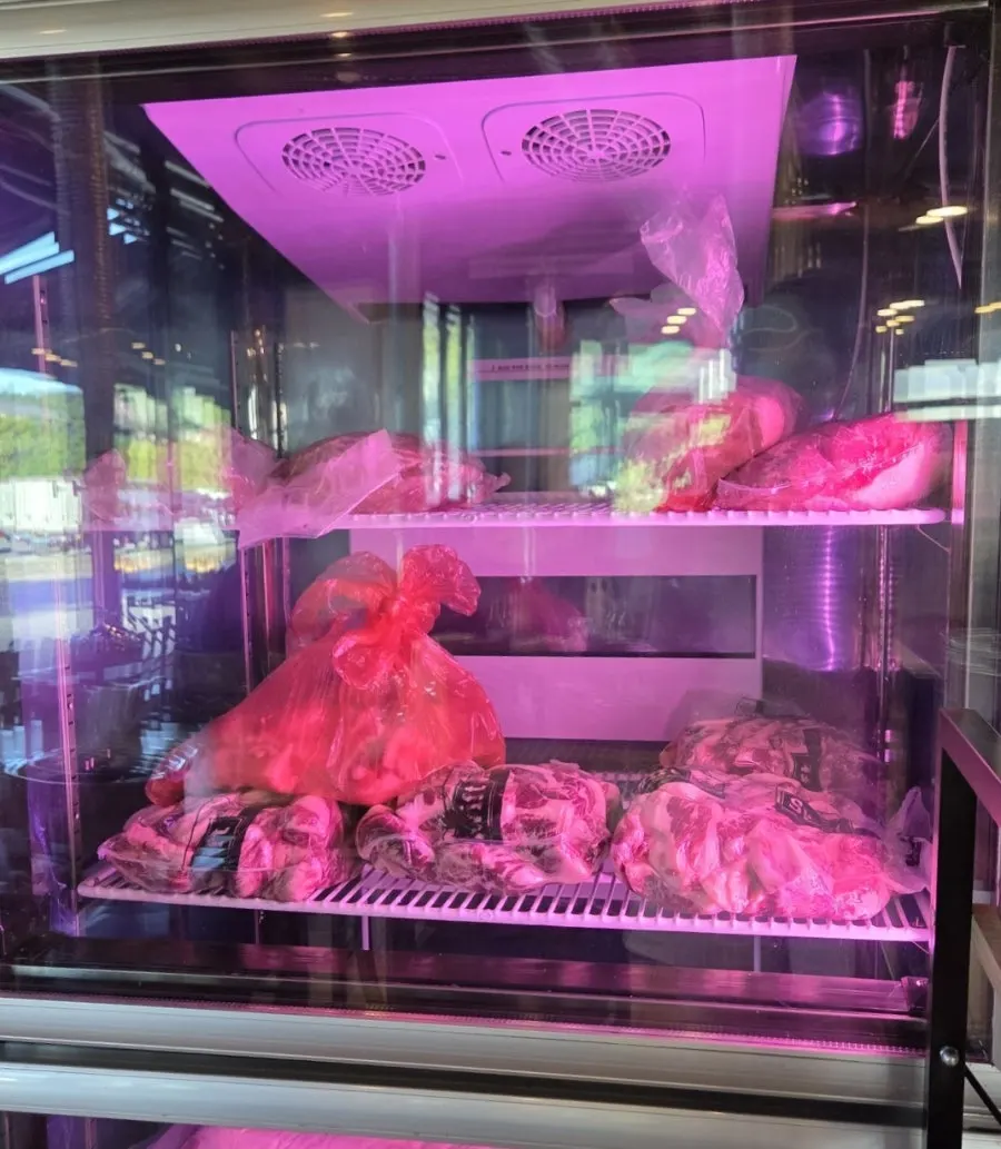 Store fridge displaying the fresh meat